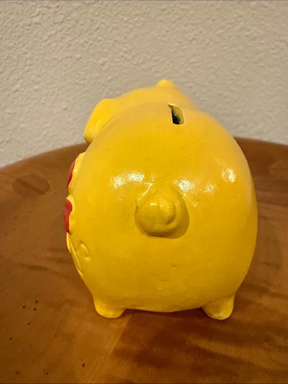 Vintage Kitschy Yellow Chalkware Piggy Bank with Red Flower